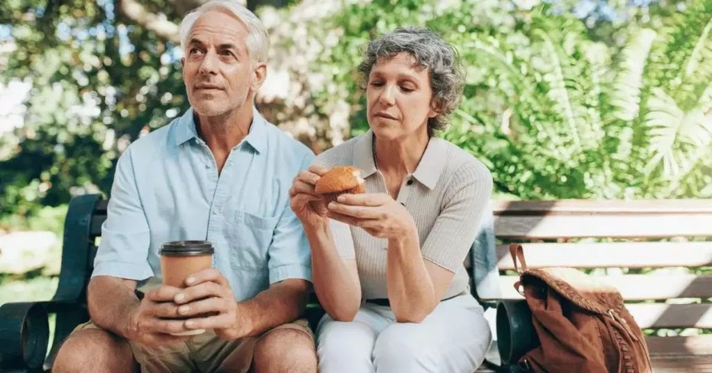 Elderly couple sitting together