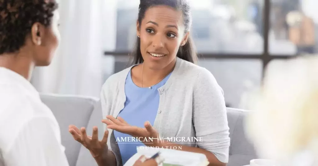 migraine patient speaking with doctor