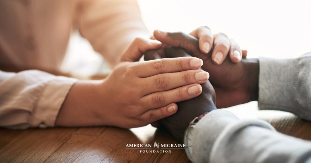 supportive hand holding