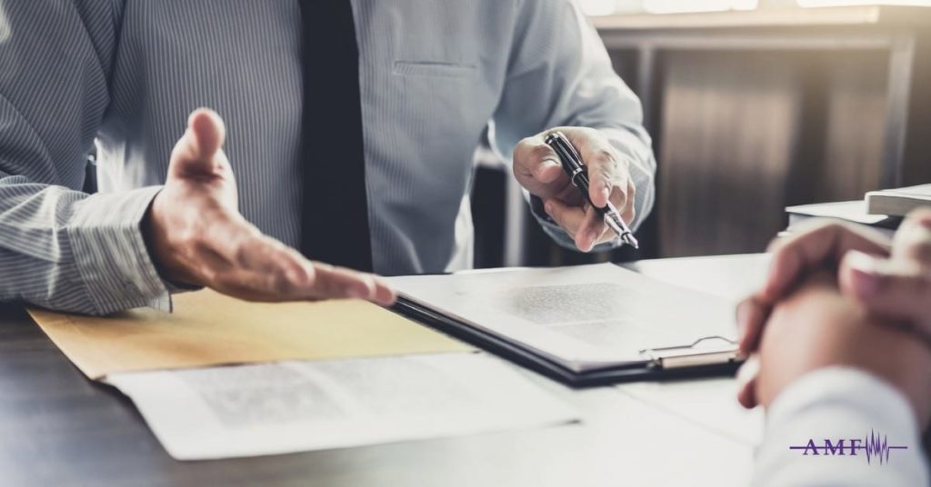 person dealing with migraine in the workplace