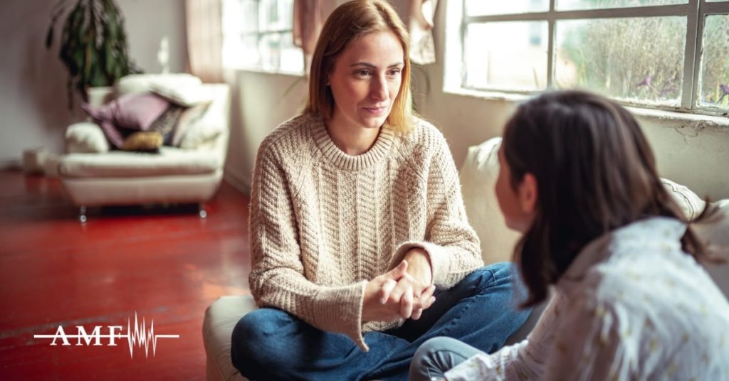 Mother explaining migraine to her child
